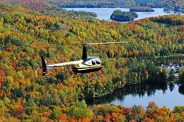 Fly over magnificent landscapes at Mont-Tremblant and end the day at Scandinave Spa Mont-Tremblant.