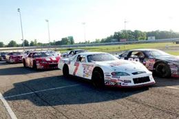 Experience driving a NASCAR style race car around the oval at Jukasa Motor Speedway.