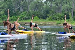 Toronto islands yoga class on stand-up paddleboard