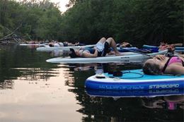 Unique Toronto yoga class on stand-up paddleboard 