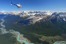 Rocky Mountains helicopter flight and horseback riding tour