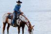 cowboy guide during helicopter tour of the Rocky Mountains