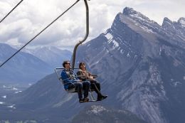 Banff Sightseeing Chairlift couple on chair