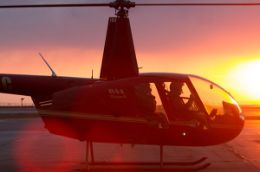 Private helicopter tour over toronto at sunset.