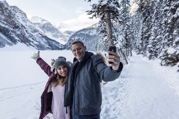 Lake Louise, Banff Alberta tour in winter, couple Lake Louise, Banff Alberta tour in winter, couple