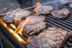 Banff covered wagonride, cowboy BBQ, steaks on grill