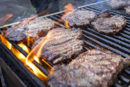 Banff covered wagonride, cowboy BBQ, steaks on grill