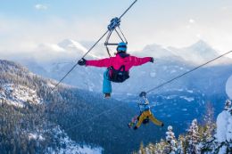 flying above Whistler backcountry - ziplining in Winter