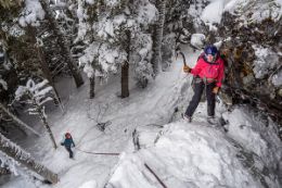 scaling ice wall with ropes, crampons, and axes, Whistler Blackcomb BC