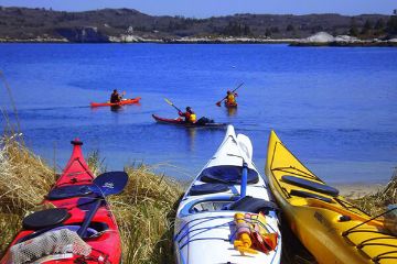 Exploring Nova Scotia rugged coastline with a skilled guide by kayak and hike. Exploring Nova Scotia rugged coastline with a skilled guide by kayak and hike.