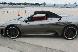 Drive an exotic car on an autocross racing track at Milwaukee Mile Speedway 